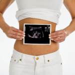 woman holding sonogram 1922245 Photo by Creatas Images on FreeImages